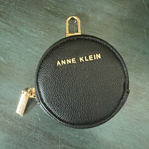 Anne Klein black leather round coin purse. Great with phone lanyard.